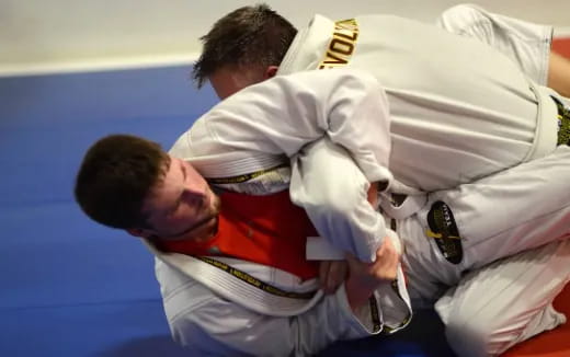 a man in a white suit