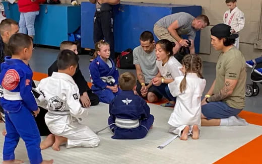 a group of children sitting on the floor