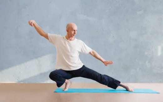 a man doing a yoga pose