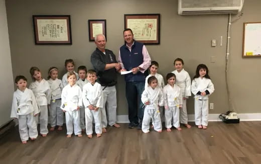 a group of people posing for a photo