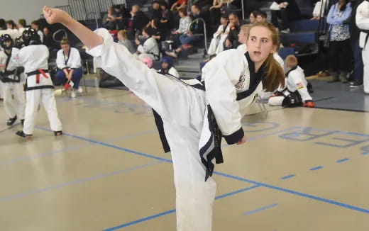 a person in a karate uniform