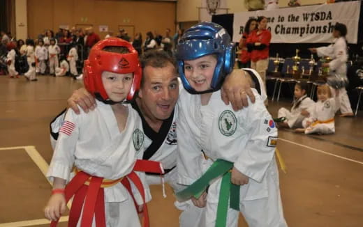 a person and a boy in garment