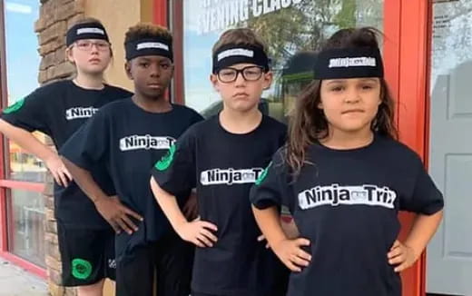 a group of people posing for the camera