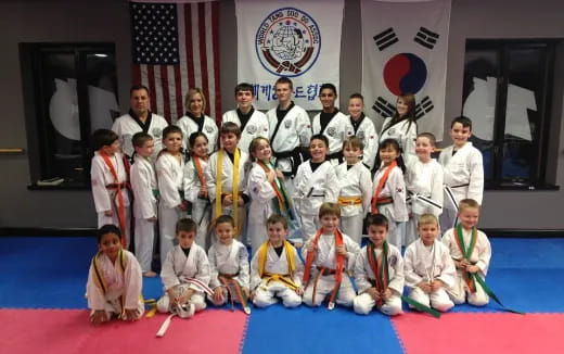 a group of people posing for a photo