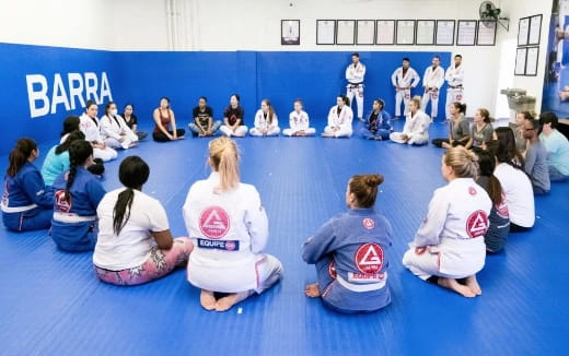 a group of people sitting on the floor