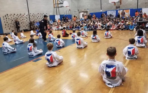 a group of people sitting on the floor