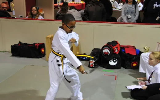 a person in a karate uniform