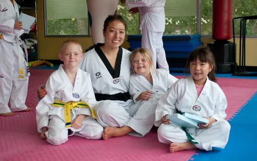a group of people in white uniforms