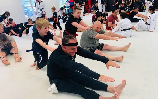 a group of people sitting on the floor