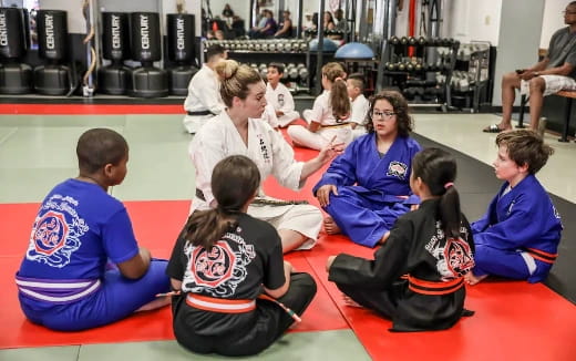 a group of people sitting on the floor