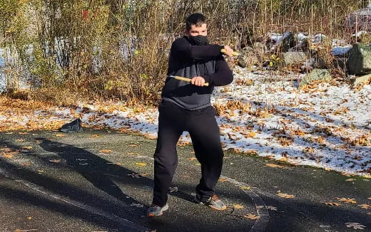 a person holding a bow and arrow