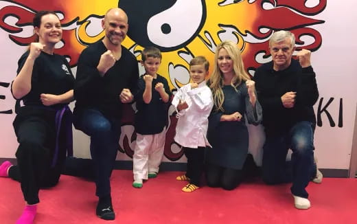 a group of people posing for a photo