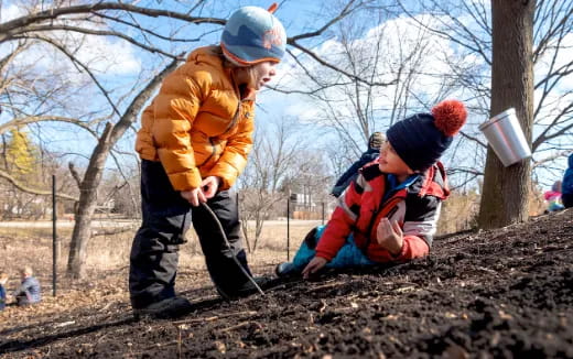 a person and a child playing outside