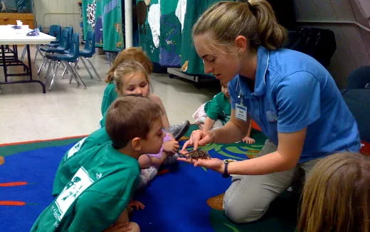 a person and several children