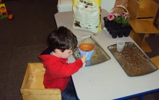 a child sitting at a table