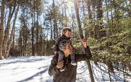 a person holding a baby