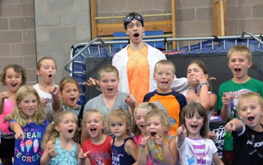 a group of children posing for a photo