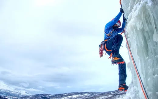 a person climbing a mountain