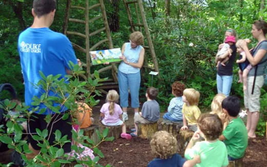 a group of people in a garden