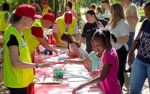 a group of people around a table