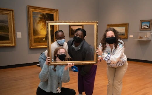 a group of people wearing masks