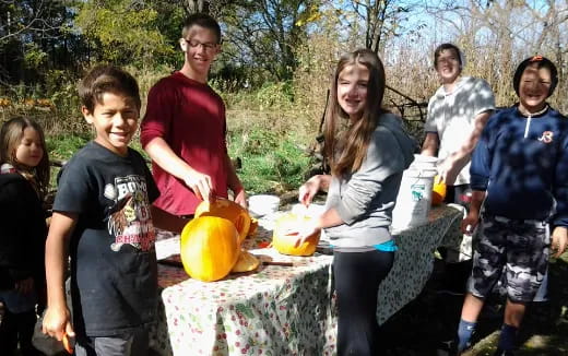 a group of people around a table