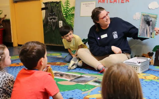 a person teaching children