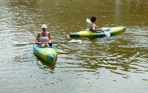 a couple of people in kayaks