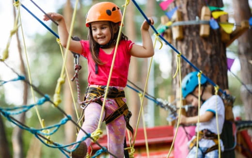 a person wearing a helmet and harness