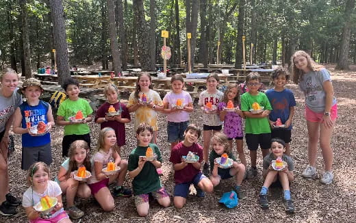 a group of children posing for a photo