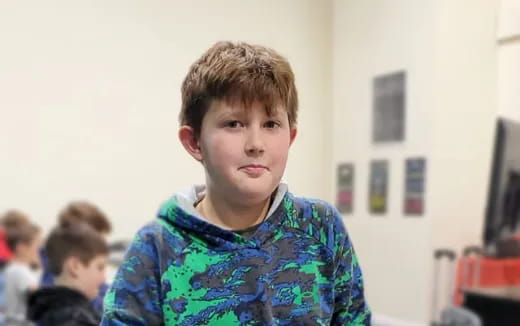a boy in a classroom