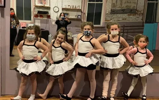 a group of women wearing clothing