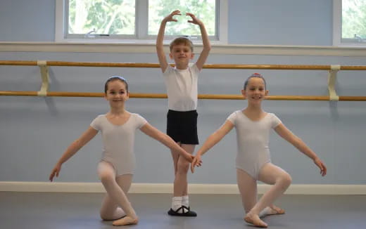 a group of girls posing for a picture