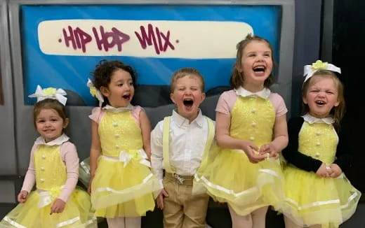 a group of children in clothing