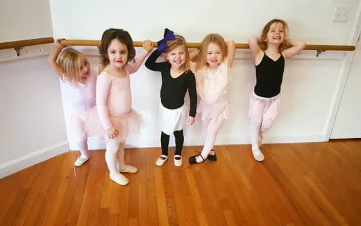 a group of girls posing for a picture