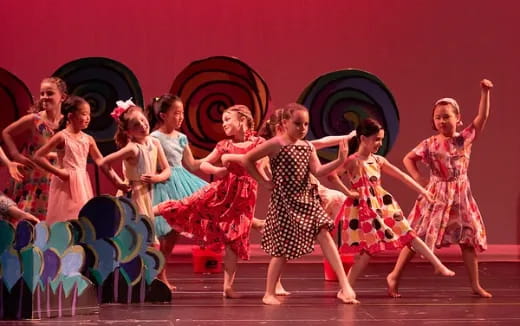 a group of children dancing