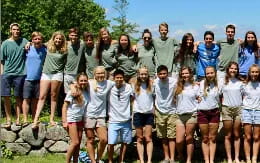 a group of people posing for a photo