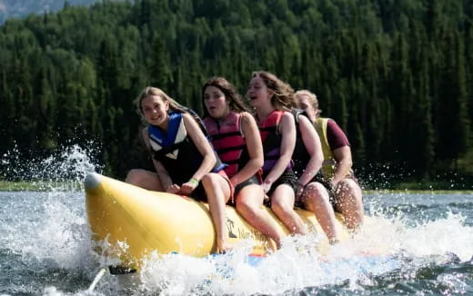 a group of people on a raft