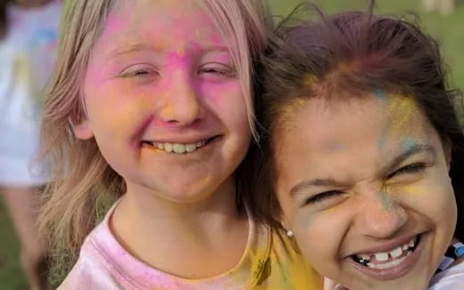 a woman and a boy smiling