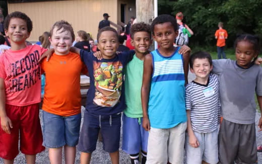 a group of boys posing for a photo
