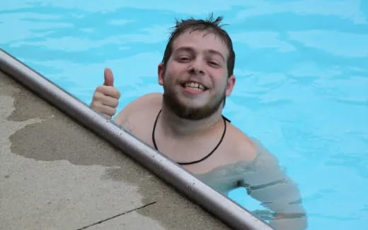 a person holding a surfboard