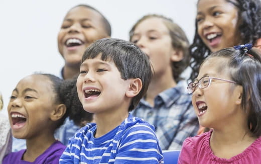 a group of children laughing