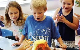 a group of children eating