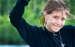 a person with a bird on the shoulder