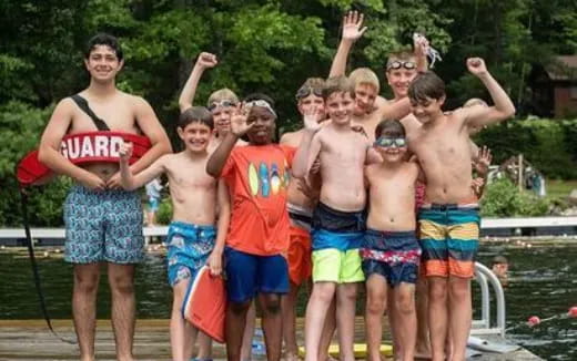 a group of men posing for a picture