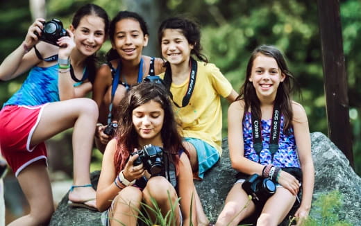 a group of women posing for a photo