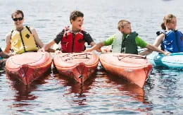 a group of people in inner tubes