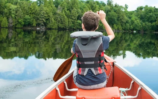 a boy on a boat