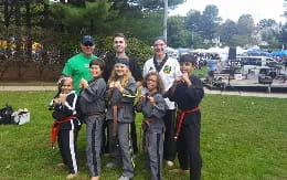 a group of people posing for a photo