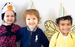 a group of children smiling